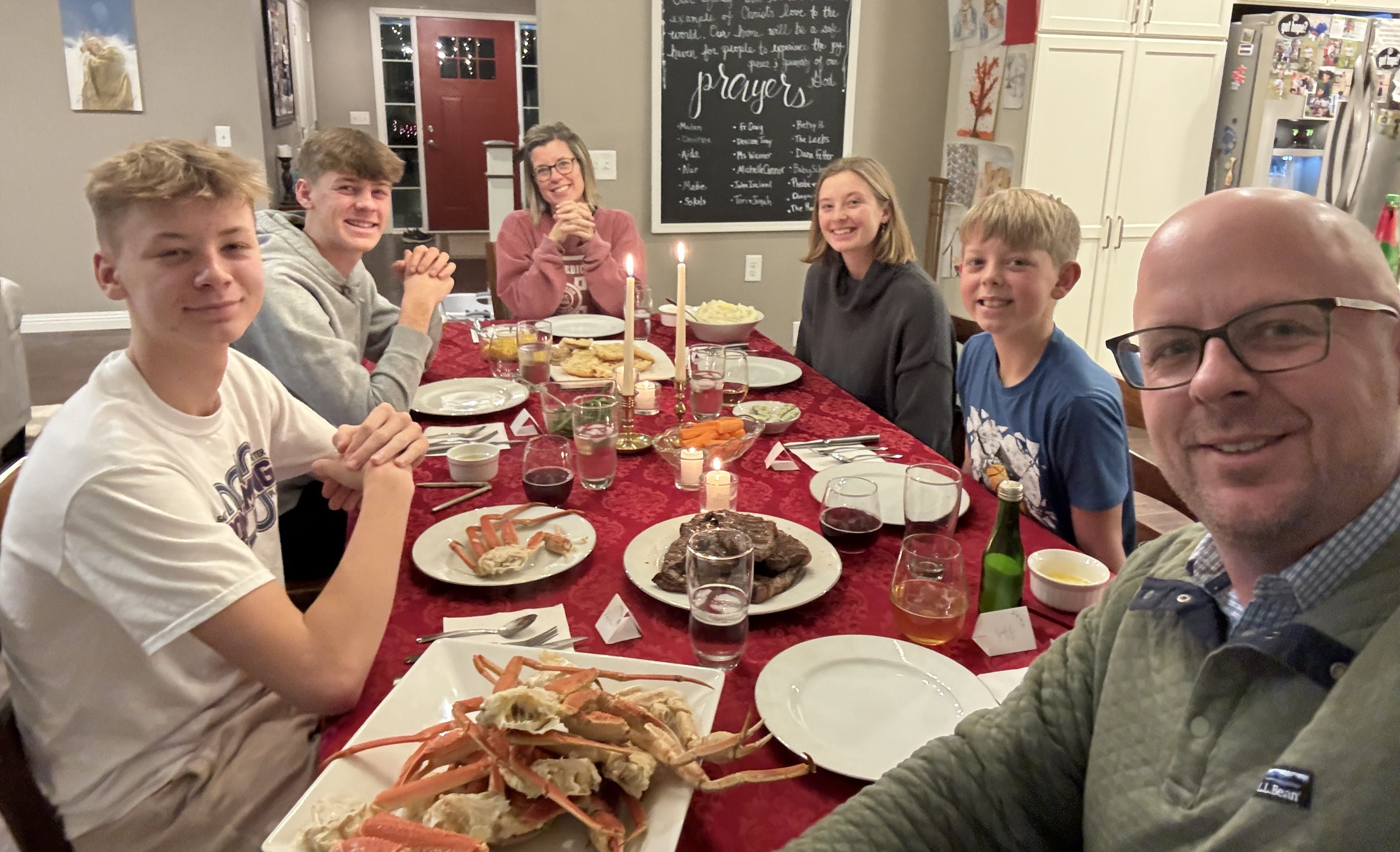 Family gathered around the dinner table